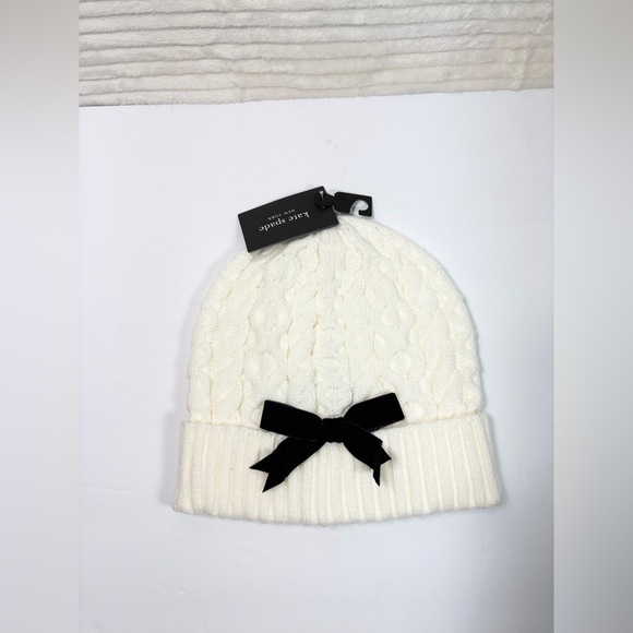 kate spade Accessories - Kate Spade Cable Knit Velvet Bow Beanie Hat Cream
NEW WITH TAGS